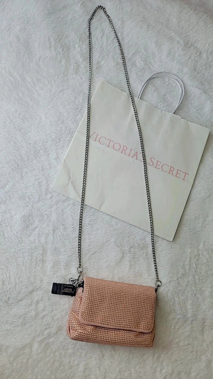 Bolsa transversal mini da Victoria's Secret, cor ouro rosa, fecho magnético.